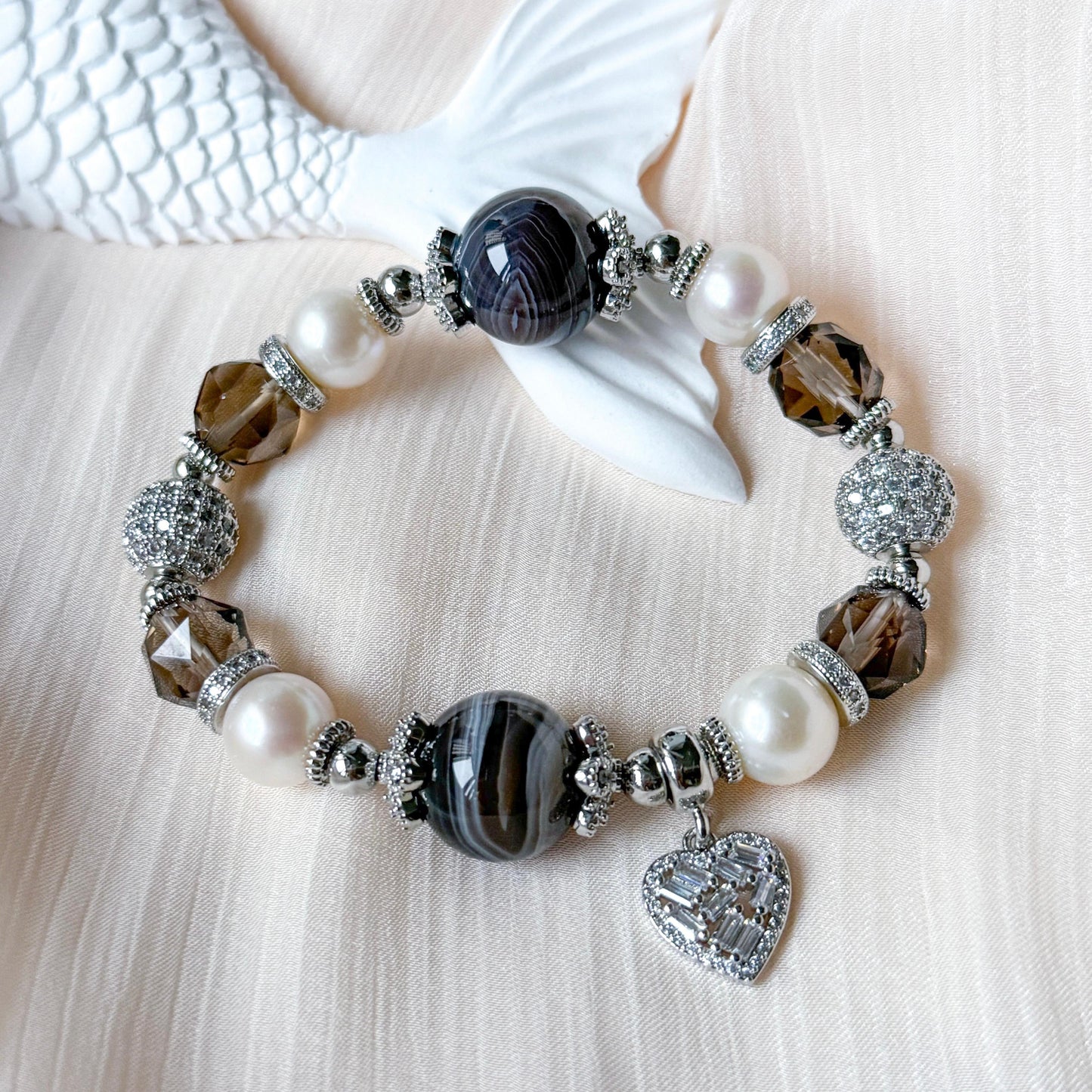 Dena [Calmness, Protection and Growth]