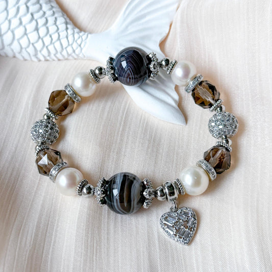 Dena [Calmness, Protection and Growth]